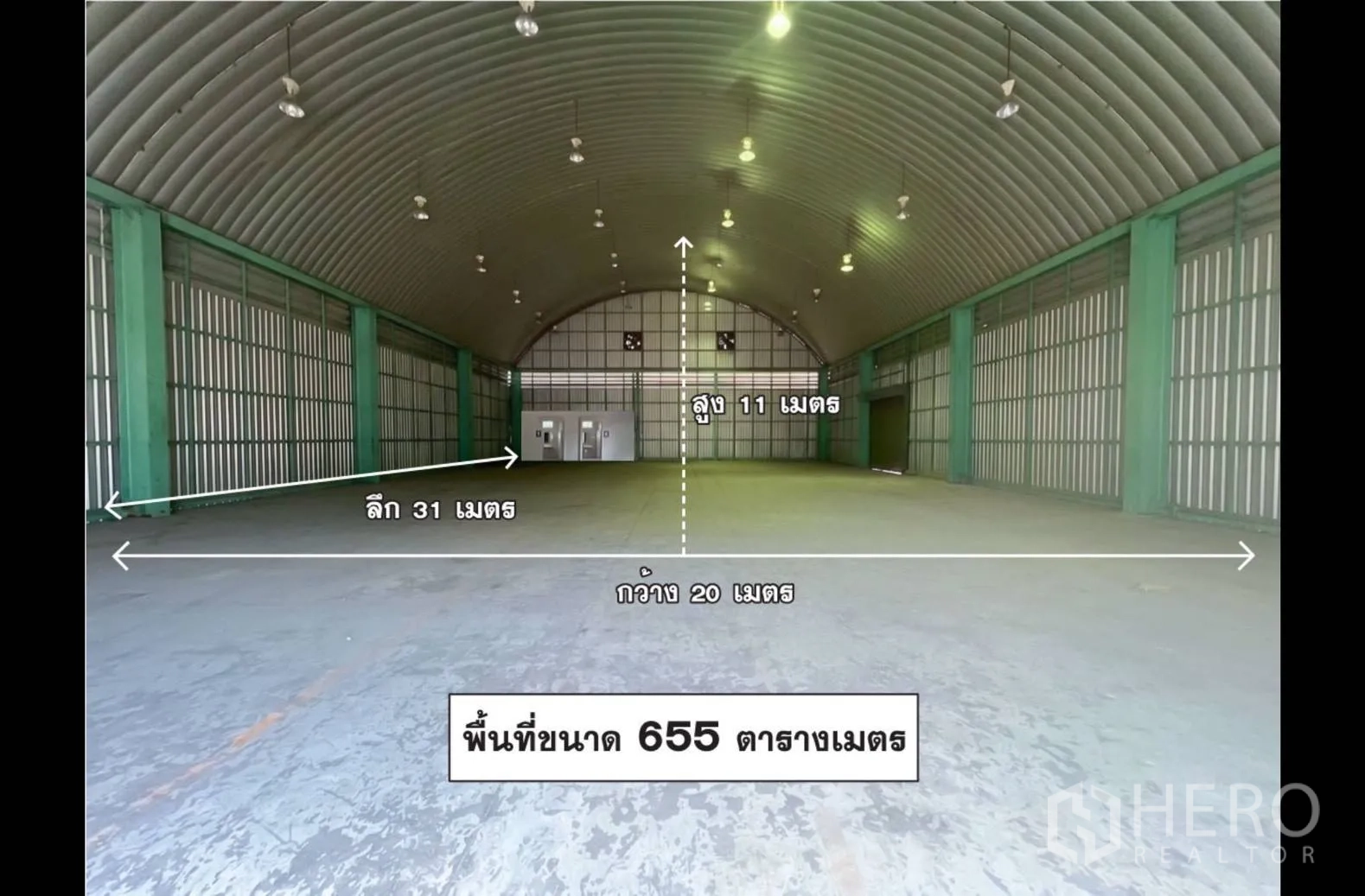 โกดัง for rent in Lak Si, Bangkok - ภาพภายในโกดังเพดานโค้งสูง พื้นคอนกรีต ไฟส่องสว่าง พร้อมตัวเลขระบุขนาด