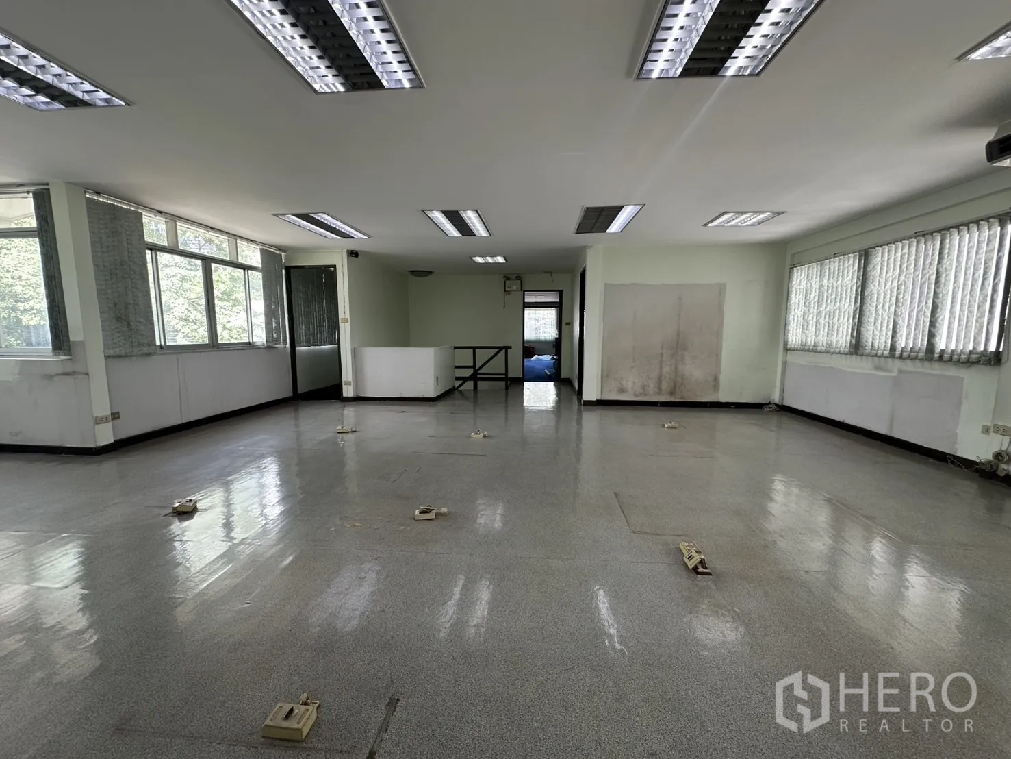 Retail Space for rent in Watthana, Bangkok - Upper corridor area with long window wall and built-in wood cabinet.
