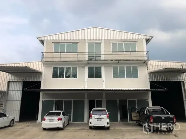 Warehouse for rent in Khlong Sam Wa, Bangkok - Front view of a three-storey warehouse with attached offices and parking in Khlong Sam Wa, Bangkok.