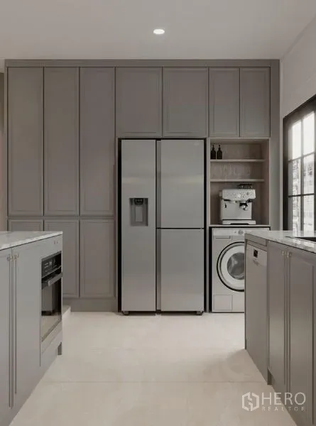 Detached House for rent in Bang Phli, Samut Prakan - Built-in gray kitchen wall with double-door fridge, washing machine and coffee station.