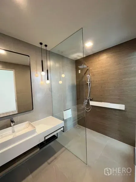 Detached House for rent or sale - Master bathroom with walk-in shower, frameless glass partition, pendant lights, and floating vanity.