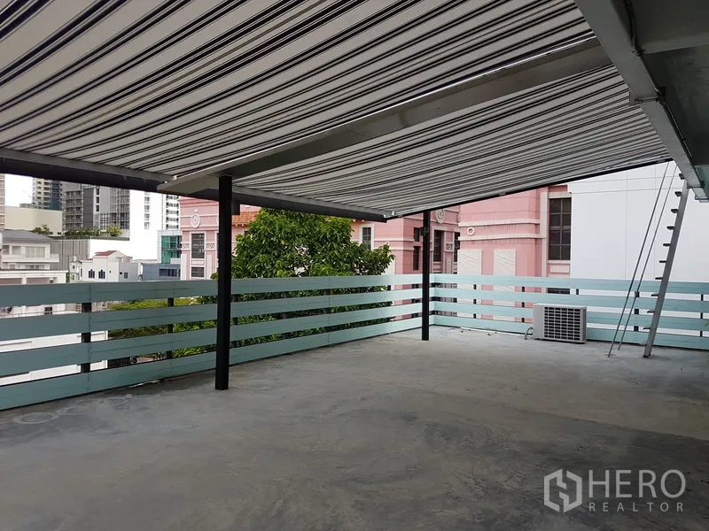 Home Office for sale in Khlong Toei, Bangkok - Open office area with glossy floors and full-height glass partition.