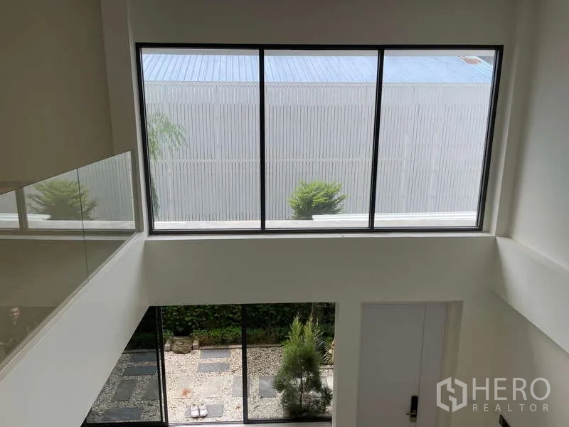 Home Office for rent in Don Mueang, Bangkok - Upper-level window view over the internal courtyard and garden.