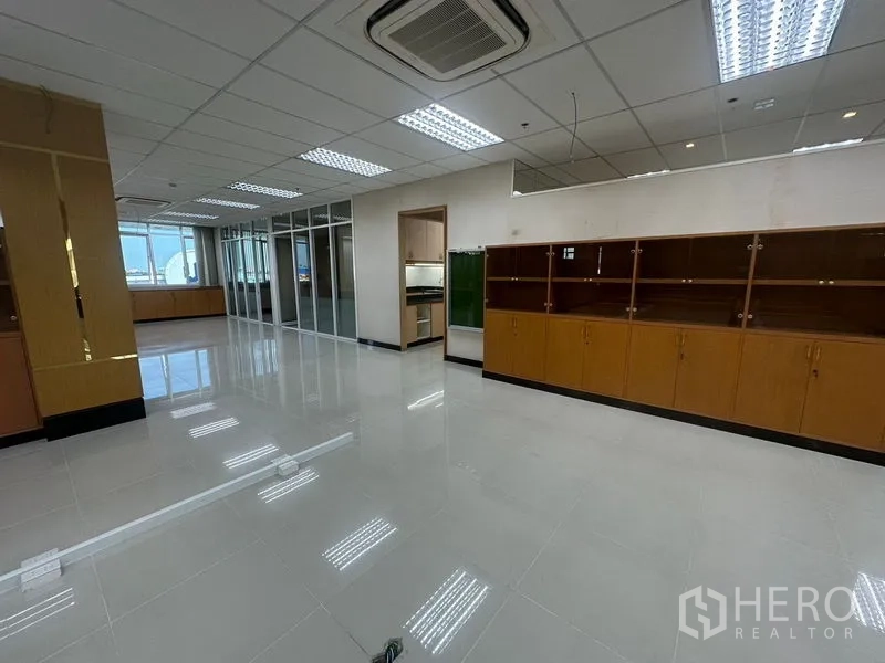 Office Space for rent in Suan Luang, Bangkok - Open area leading to glass-partition rooms and pantry, with storage cabinets