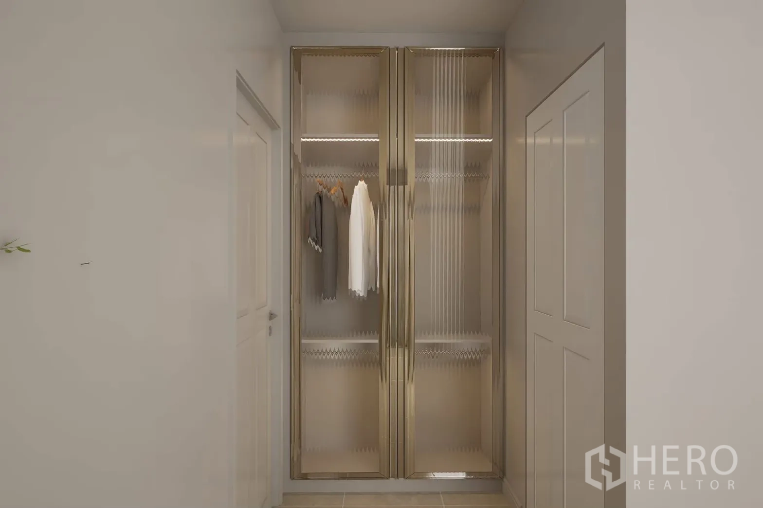 Detached House for rent in Bang Phli, Samut Prakan - Compact closet with gold-framed ribbed glass doors.
