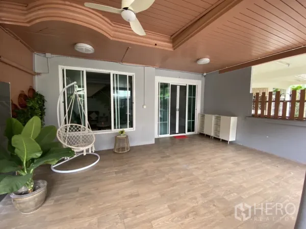 Townhouse for rent or sale - Covered carport with wood ceiling, ceiling fans and sliding glass doors.