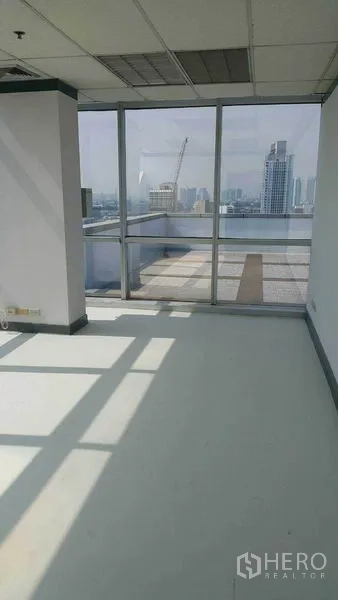 Office Space for rent in Khlong Toei, Bangkok - Glass doors leading to a rooftop terrace overlooking the Bangkok skyline.