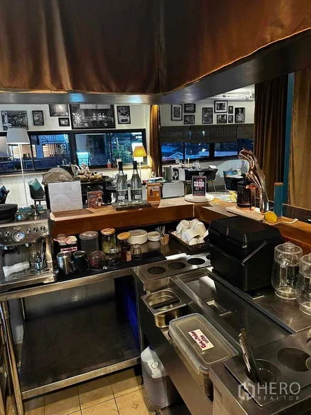 Retail Space for rent in Watthana, Bangkok - Bar service station with equipment, sink and storage compartments.