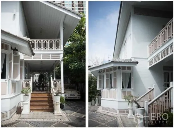 独立式住宅 出租在Bang Rak, Bangkok - 前廊带木台阶和栏杆，旁有树荫车位。
