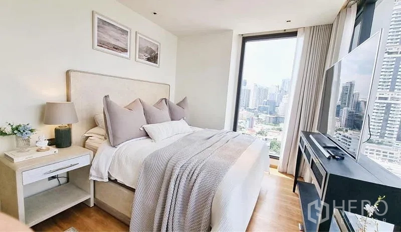 Condominium for sale - Bedroom from another angle with large window and skyline outlook.