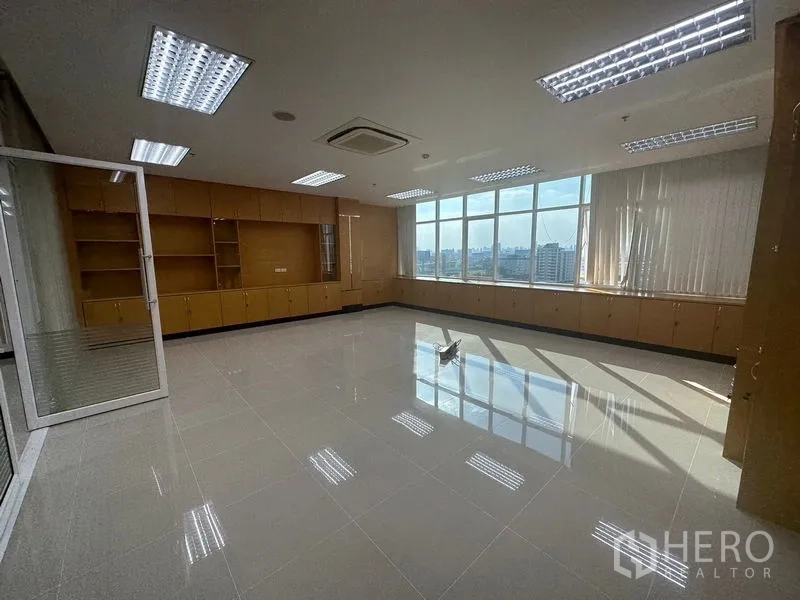 Office Space for rent in Suan Luang, Bangkok - Private room with wall cabinets, big windows and fluorescent lighting.