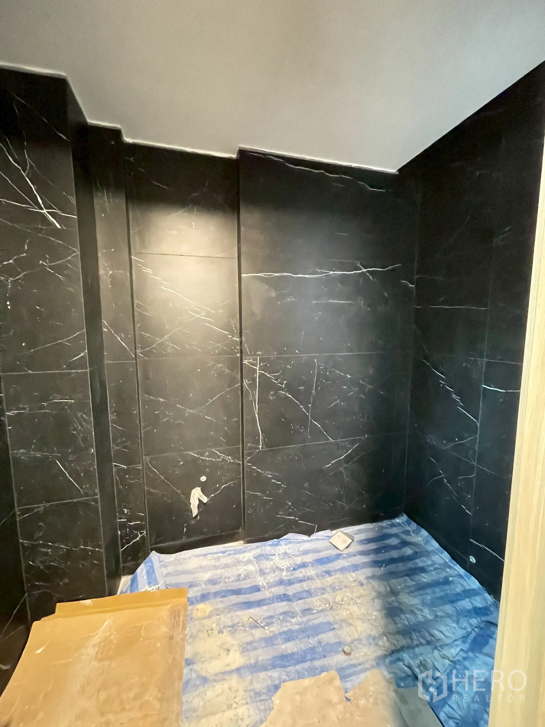 Detached House for sale in Bang Phli, Samut Prakan - Black marble-tiled shower room in progress.
