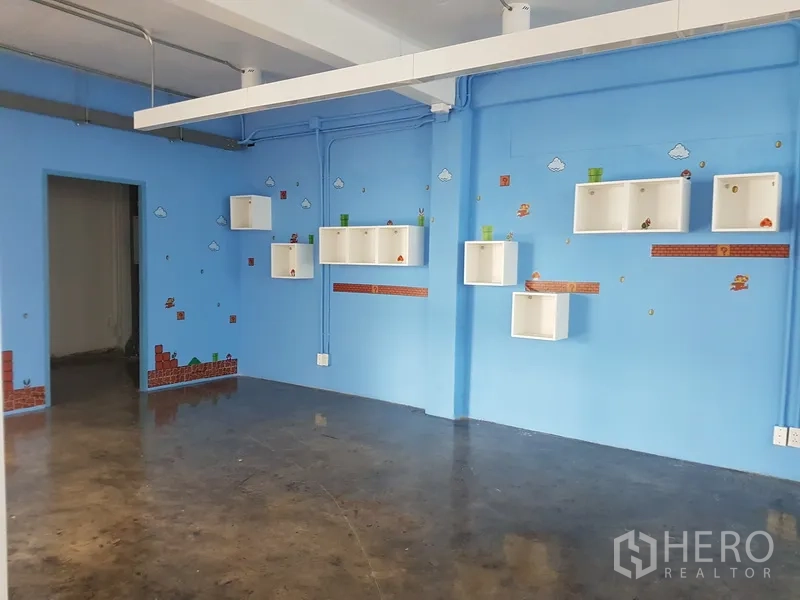 Home Office for sale in Khlong Toei, Bangkok - Open office with purple accent wall and a glass door.