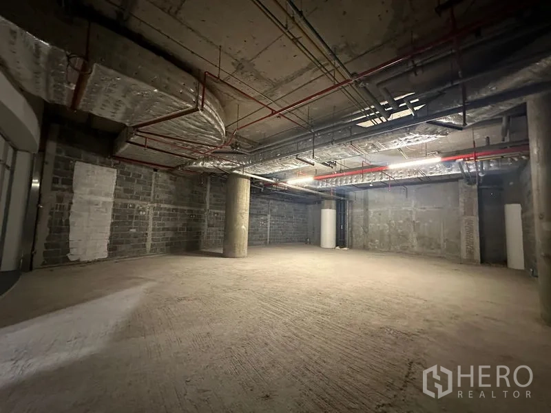 Retail Space for rent - Large rectangular commercial shell showing MEP provisions, exposed ventilation and ample floor area.