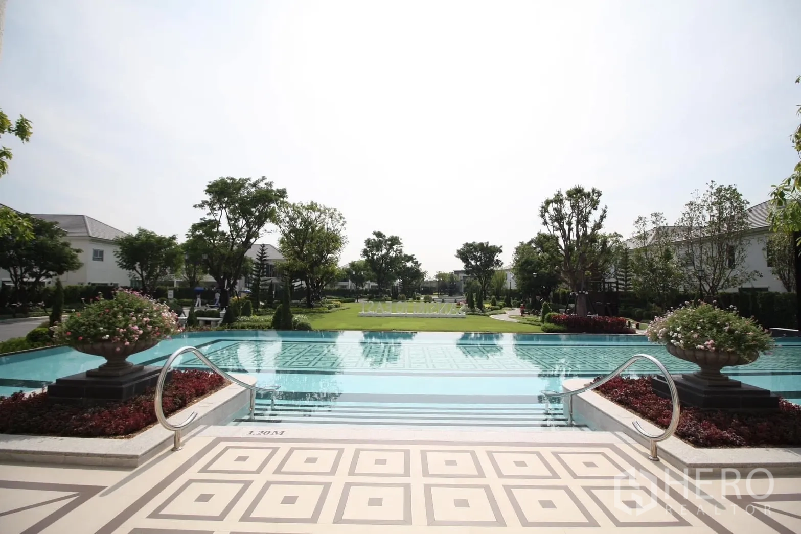 Detached House for rent in Bang Phli, Samut Prakan - Infinity-edge pool opening to a green central park and manicured gardens.