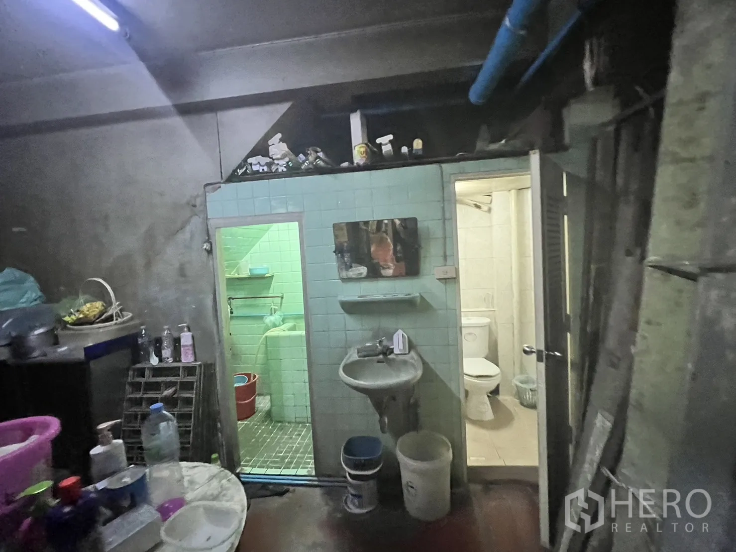 Retail Space for rent in Watthana, Bangkok - Back-of-house washroom with tiled sink area and a separate toilet.