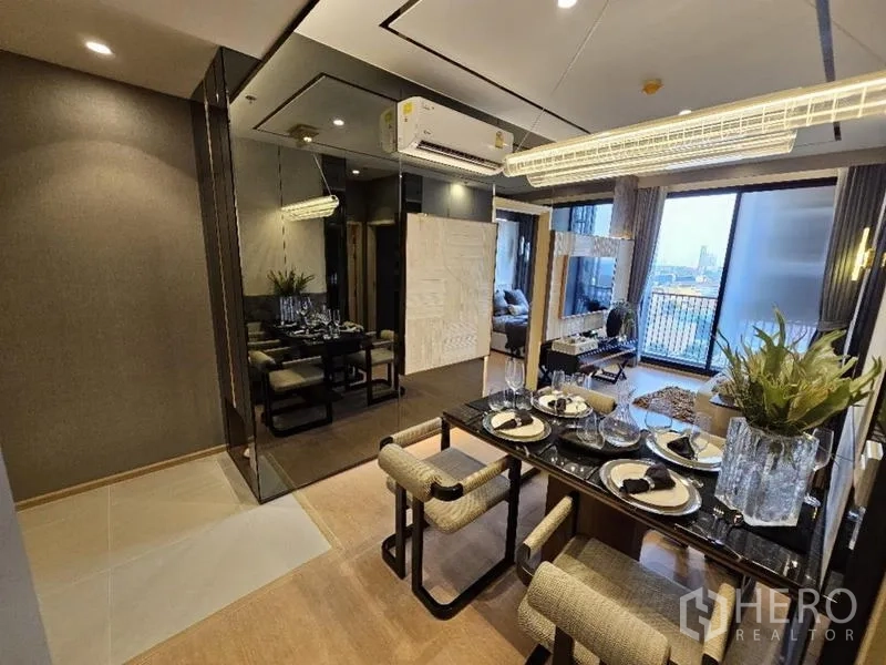 Condominium for rent - Dining zone for four looking toward balcony and city skyline.
