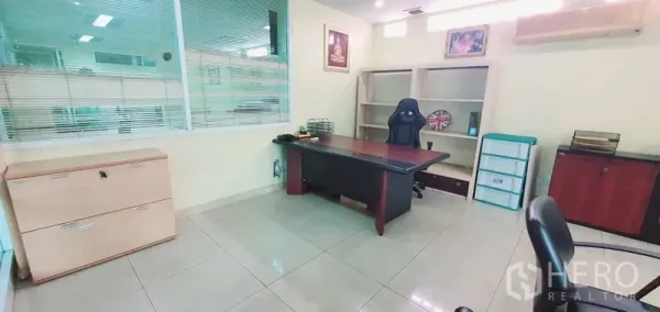 Office Space for rent in Bang Kho Laem, Bangkok - Private executive office with desk, shelving, tiled floor and air-conditioning.