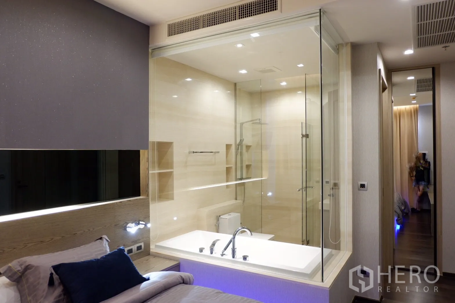 Condominium for rent in Watthana, Bangkok - Glass-walled bathroom with soaking tub and separate shower off the master bedroom.