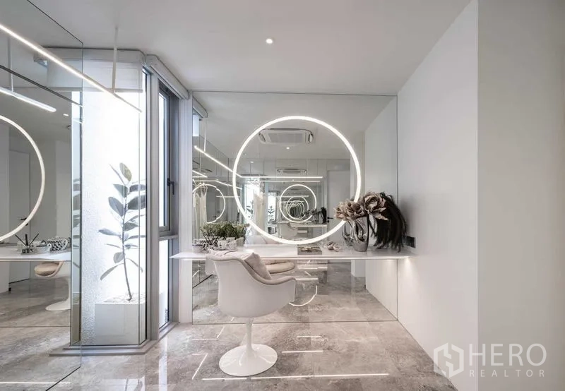 Detached House for sale in Saphan Sung, Bangkok - Light-filled dressing room with circular backlit mirror and built-in desk.