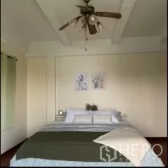 Detached House for rent in Phra Khanong, Bangkok - Bright master bedroom with ceiling fan, large bed, soft lighting and minimalist decor.