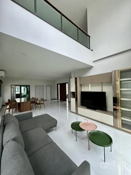 Detached House for rent in Bang Phli, Samut Prakan - Loft-style living area showing glass balustrade and open-plan layout.