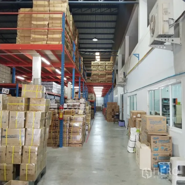 Warehouse for rent in Bang Khun Thian, Bangkok - Tall storage racks with wide forklift aisle in the warehouse.