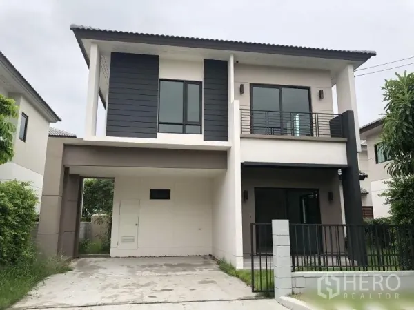 Detached House for sale in Bang Phli, Samut Prakan - Two-storey modern detached house with balcony, driveway and gated front yard