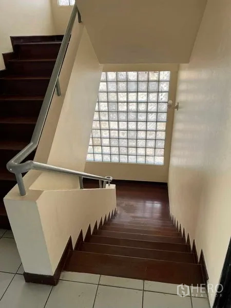 Office Space for rent or sale in Suan Luang, Bangkok - Stairwell with glass-block window bringing natural light into the office.