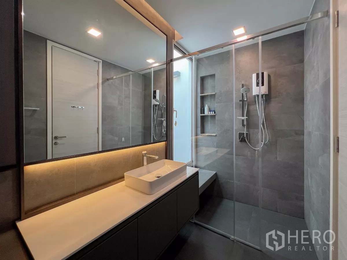 Detached House for sale in Bang Phli, Samut Prakan - Another bathroom with glass shower, vanity and warm lighting