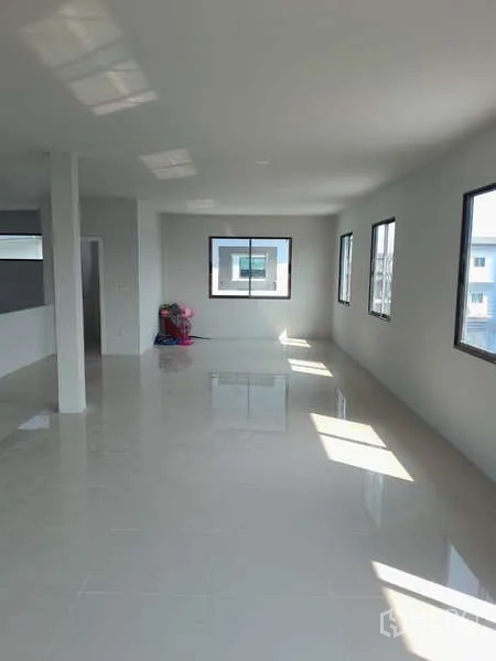 Warehouse for rent or sale in Krathum Baen, Samut Sakhon - Bright second-floor office area with large windows and glossy tiled flooring.