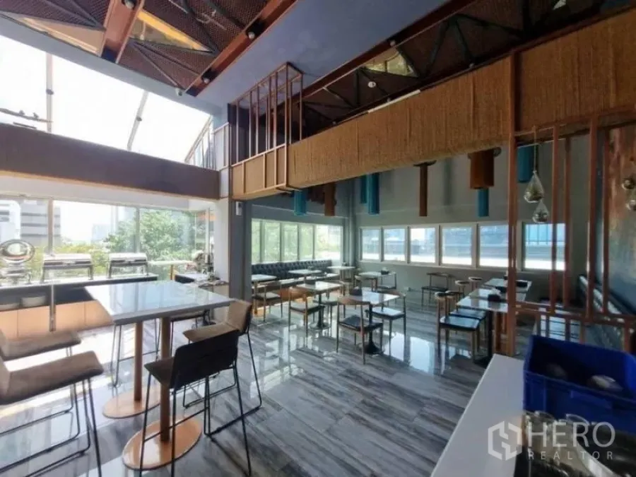 Retail Space for rent in Bang Rak, Bangkok - Bright restaurant interior with mezzanine and flexible seating layout.