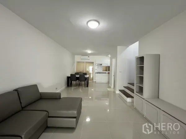 Townhouse for rent in Bang Kapi, Bangkok - Open-plan lounge looking toward dining area and kitchen.