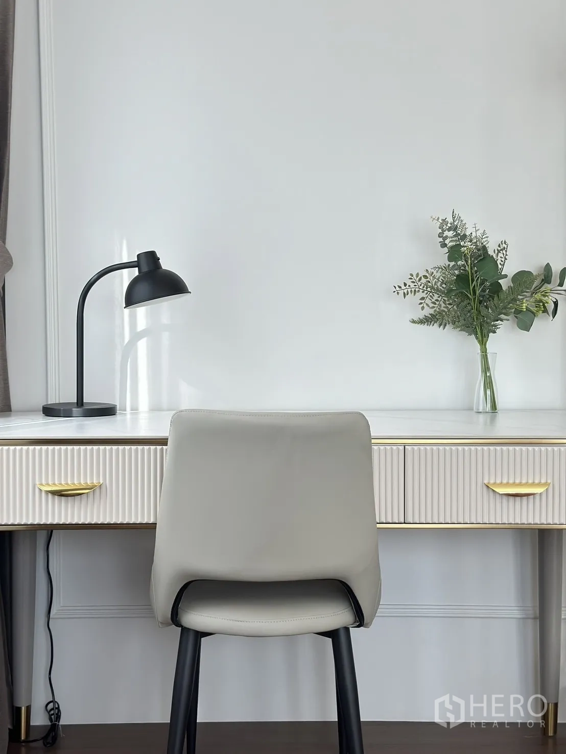 Detached House for rent or sale - Work-from-home desk with ribbed drawers, task lamp and chair beside window.