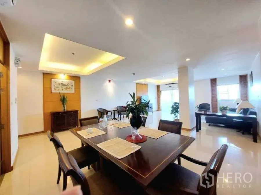 Apartment for rent - Open-plan dining and living space with recessed ceilings and large windows.
