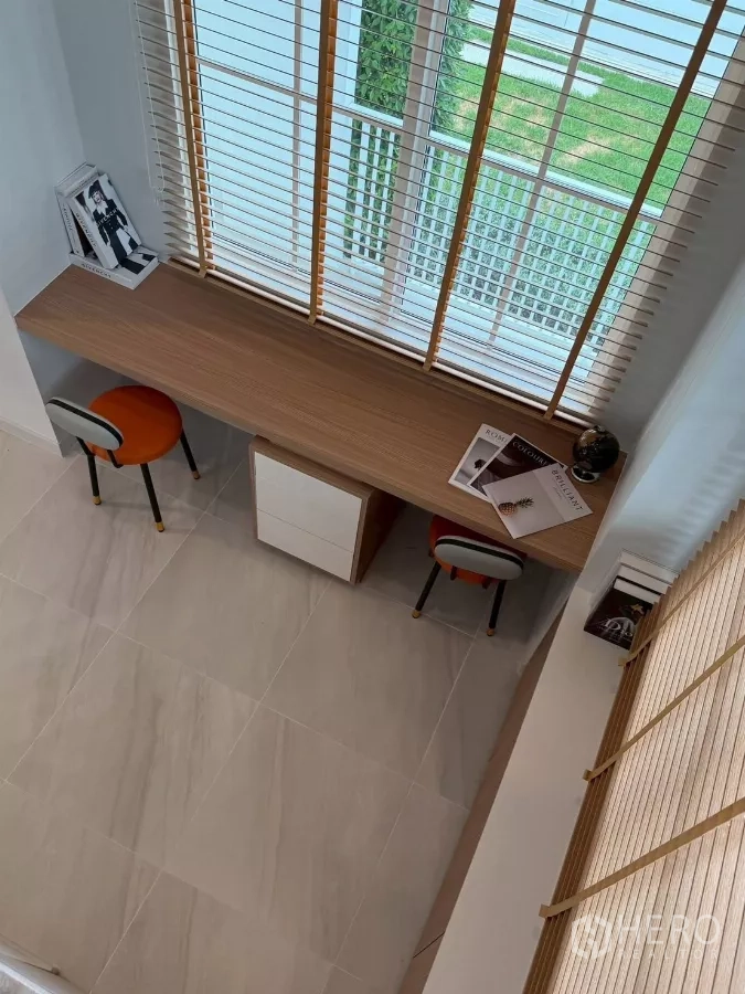 Detached House for rent in Bang Phli, Samut Prakan - Upper-floor work zone with long built-in desk beneath large windows with blinds