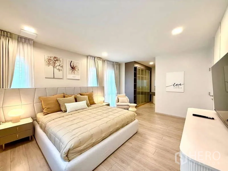 Detached House for rent in Bang Phli, Samut Prakan - Master suite view to walk-in closet with sliding doors and vanity.