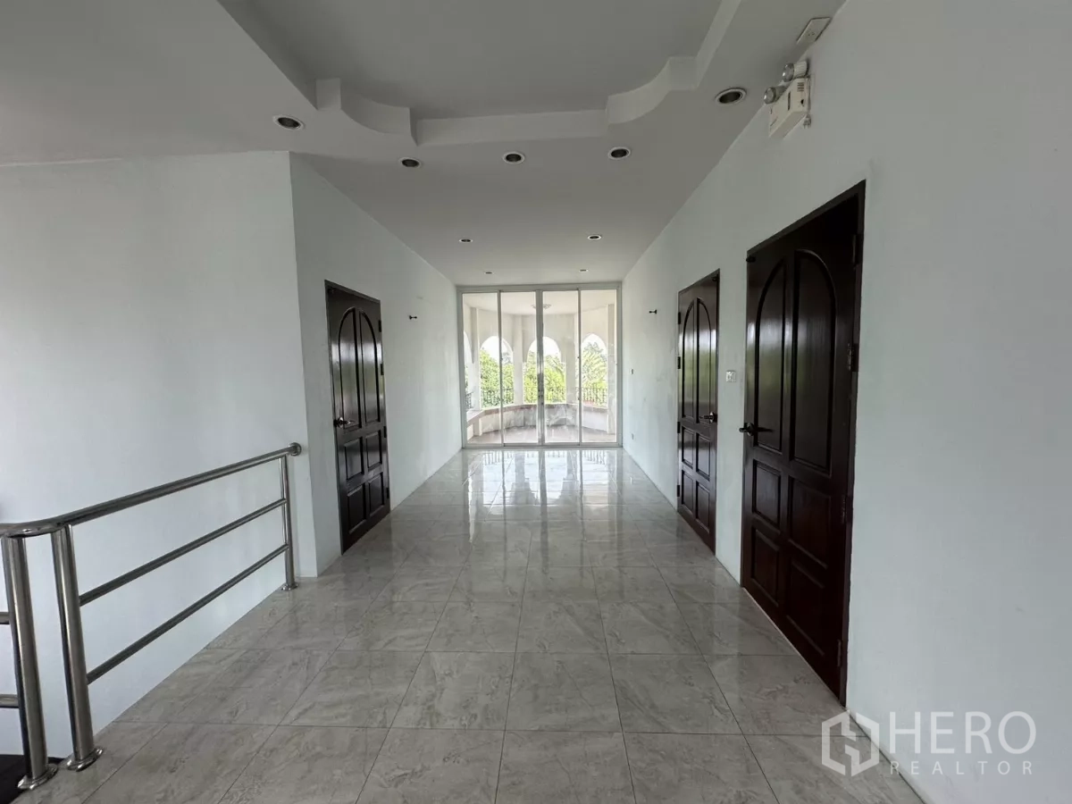 Home Office for rent - Small room with two windows providing natural light.