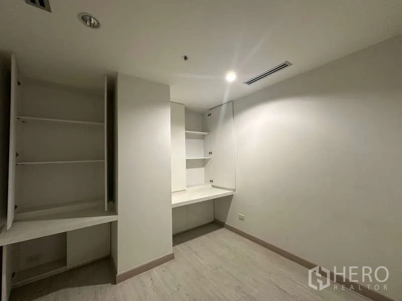Retail Space for rent in Pathum Wan, Bangkok - Storage and work area featuring open shelving and built-in workstation.