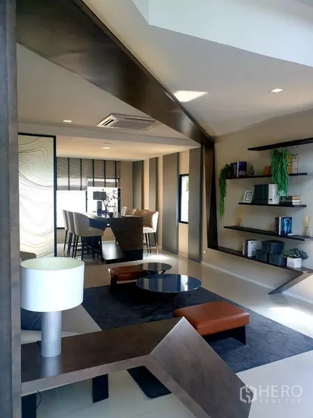 Home Office for rent - Stylish lobby lounge with modern seating and floating display shelves.