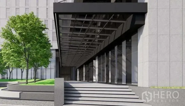 Retail Space for rent in Khlong Toei, Bangkok - Grand stepped entry with glass facade and canopy leading to the retail space.