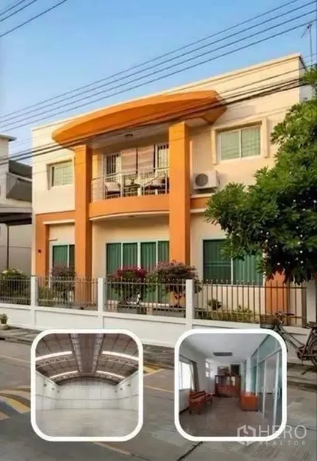 Factory for rent in Phra Samut Chedi, Samut Prakan - Two-storey factory office facade with orange columns, balcony, and a gated fence.