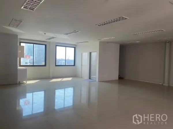 Office Space for rent in Bang Na, Bangkok - Sunlit office zone with two large windows, city outlook and a separate small room.