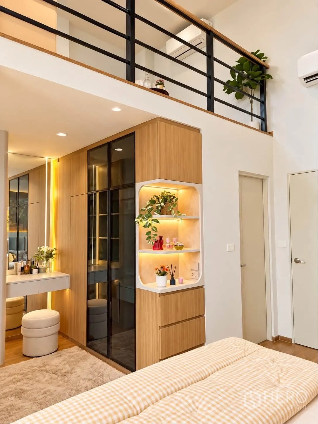 Townhouse for rent in Bang Phli, Samut Prakan - Staircase leading to loft area above master bedroom with vanity and storage.