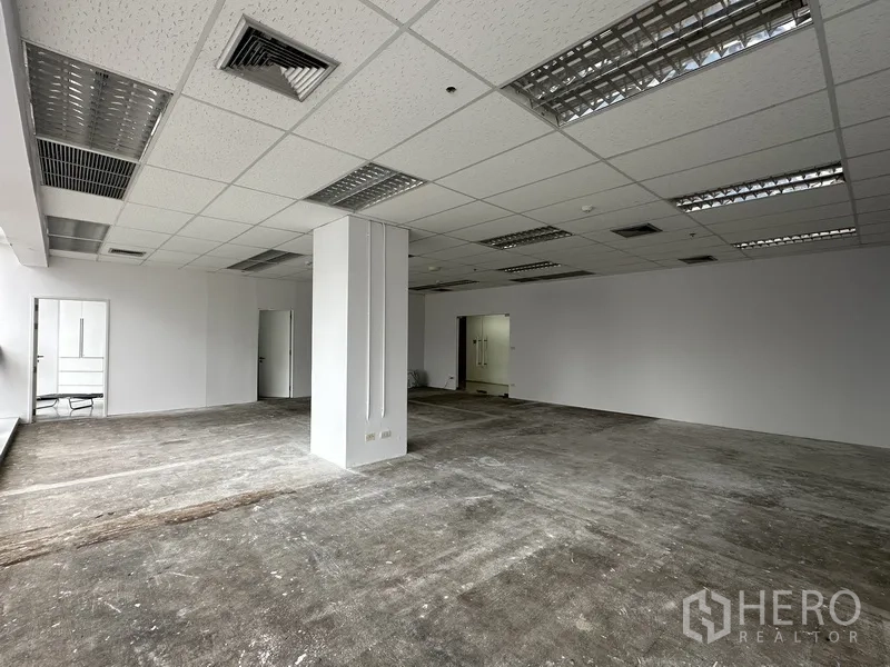 Office Space for rent in Watthana, Bangkok - Large floor plate with ceiling air-conditioning vents and access doors.