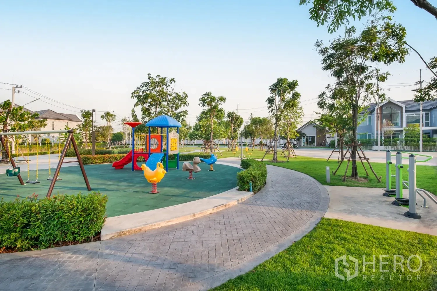 Detached House for rent in Lam Luk Ka, Pathum Thani - Community park with children’s playground, swings, and walking paths.