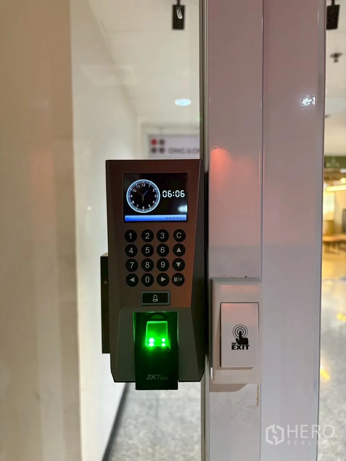 Office Space for rent in Khlong Toei, Bangkok - Keypad and fingerprint access control on a glass office door.