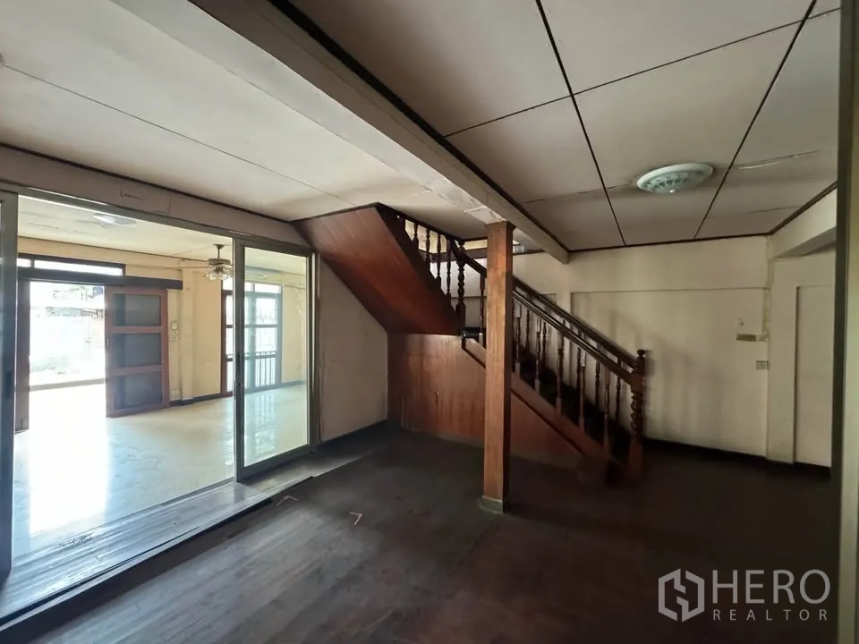 Detached House for rent or sale in Watthana, Bangkok - Central stair hall connecting to bright front room with sliding doors.