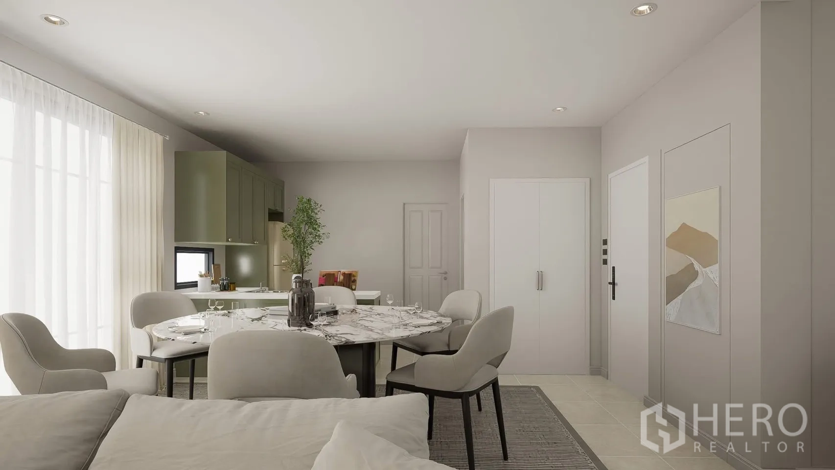 Detached House for rent in Bang Phli, Samut Prakan - Dining space beside a light kitchen with green cabinetry.