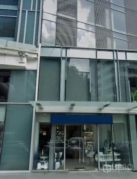 Retail Space for rent in Watthana, Bangkok - Glass-fronted building facade with street-level shop entrance in Sukhumvit.